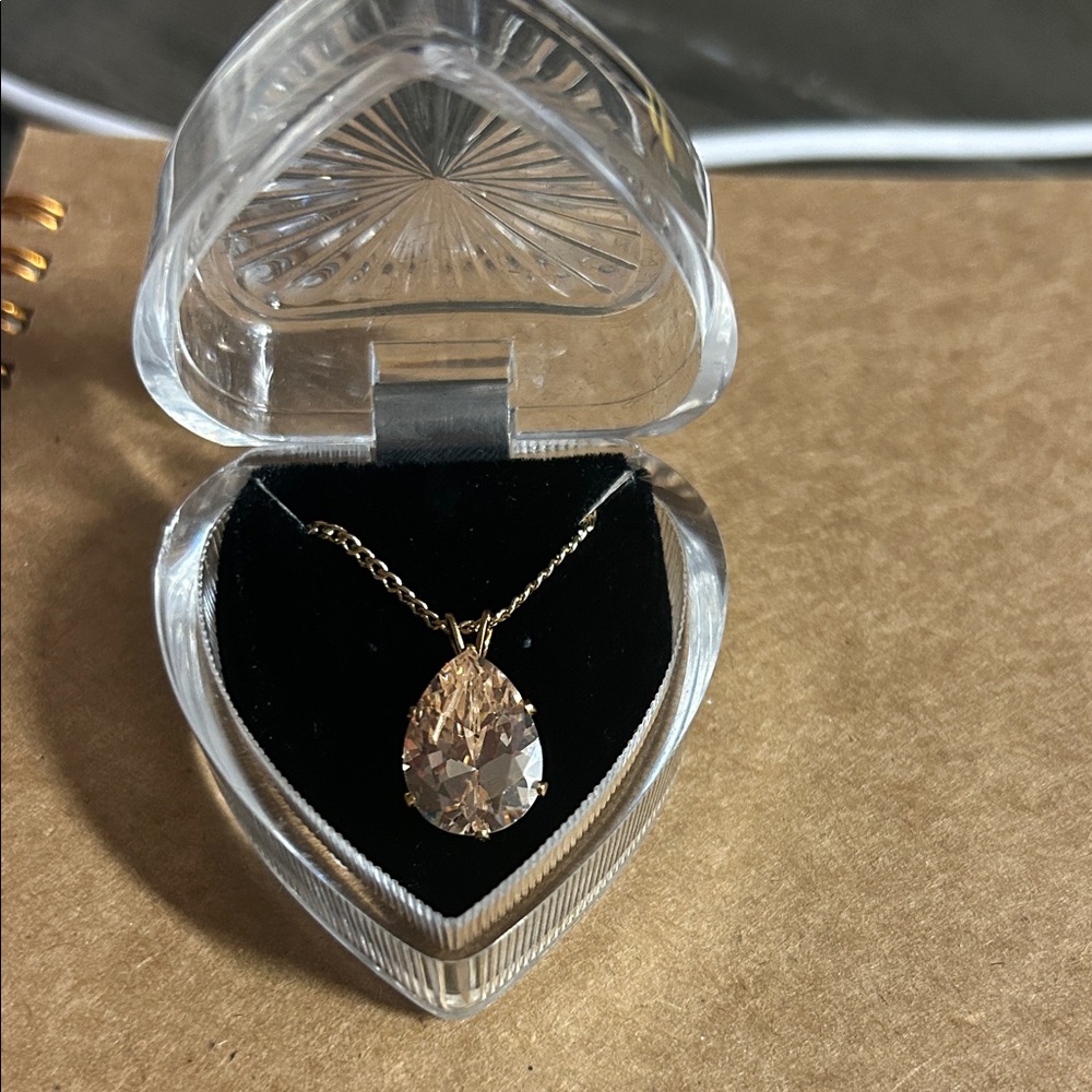 gold-tone chain necklace featuring a pear-shaped crystal pendant,‎ Swarovski